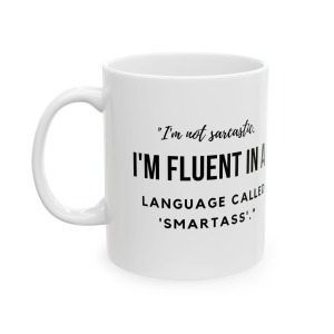 🔥 The “Funny” Mug Series is HERE! 🔥"I'm not sarcastic. I'm fluent in a language called 'Smartass'." Ceramic Mug 11oz